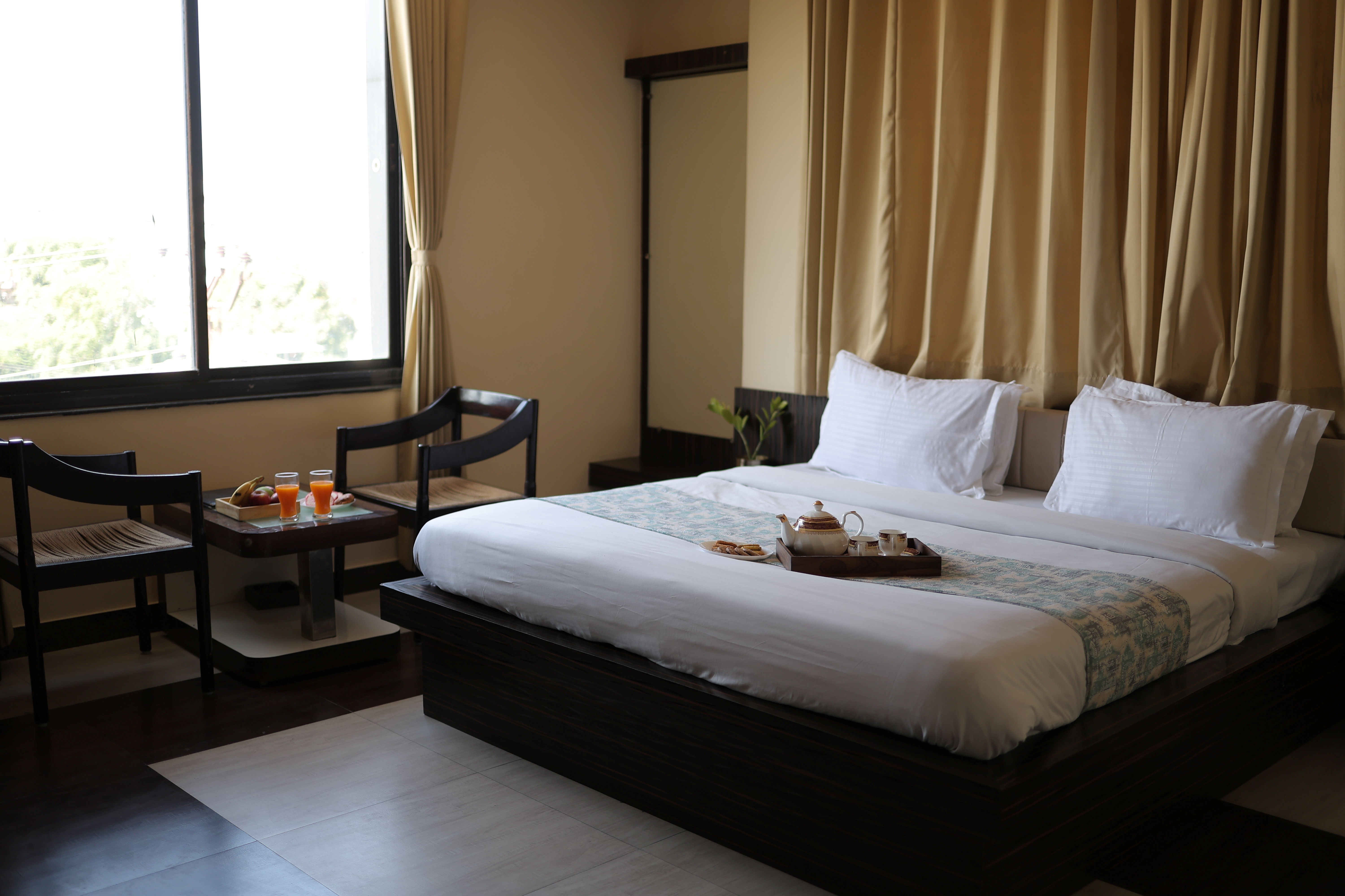 Deluxe room at Hotel Greenland Udaipur